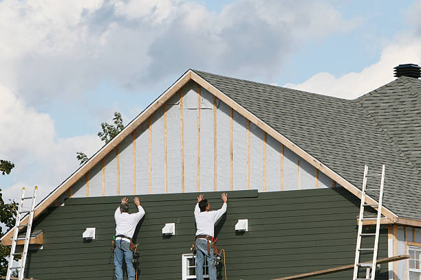 Professional Storm Damage Siding Repair technician working in Gates, NC